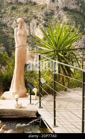 Slender beauty on the edge of the depths. Sculptures Earth Goddesses` by Jean Philippe Richard in the Exotic Garden, located at the top of the hill. Stock Photo